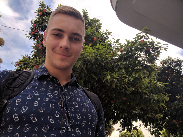 Kolonaki, Athens, Greece - A selfie with an orange tree coming down from Likavittos hill during my 2018 spring break vacation to Greece.