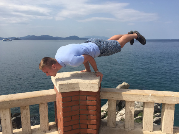 Piombino, Tuscany, Italy - Showing off my elbow lever by the lighthouse before our ferry ride to Elba during my 2018 April tour to Italy.